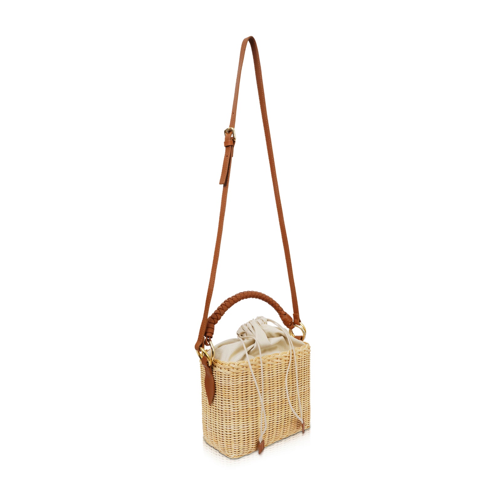 meli melo - Santina bucket bag in tan - recreating a woven basket 🧺 feel  in our signature 🇮🇹 leather • shop it in tan, black and dark tan
